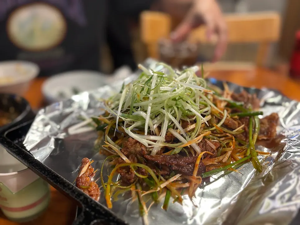 Table setting with charcoal gochujang bulgogi