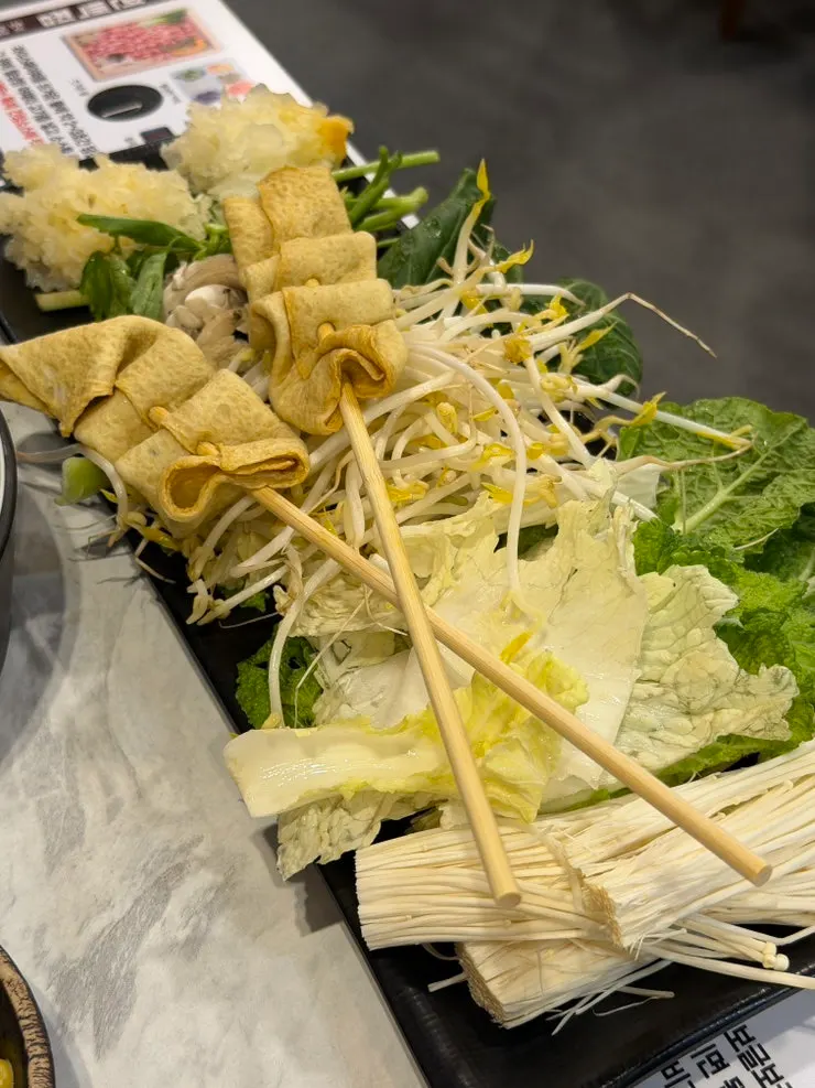 Shabu-shabu broth and self-serve ingredients