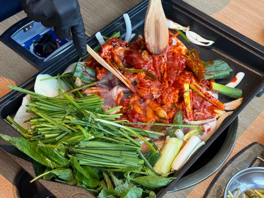 Sauced duck filling the grill