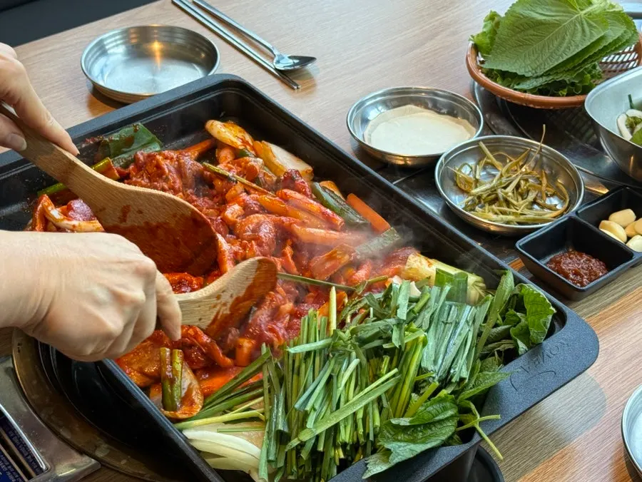 Marinated duck with bubbling sauce
