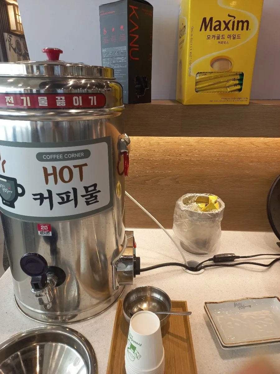 Maesil tea and sikhye at the self-serve bar