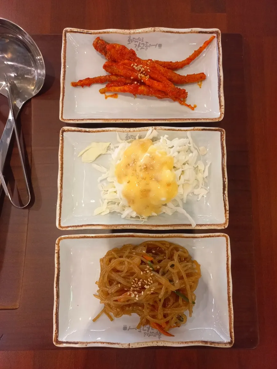 Table setting for grilled mackerel and stir-fried pork