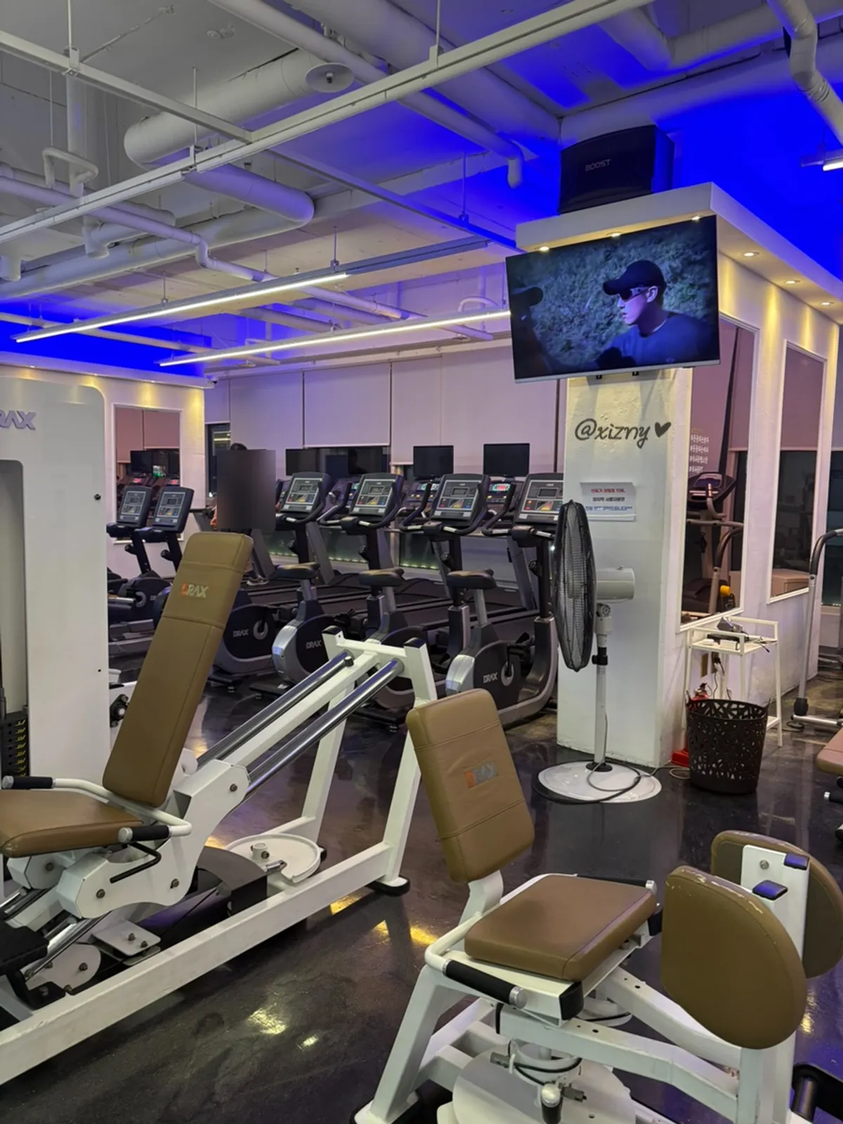 White and beige weight-training area