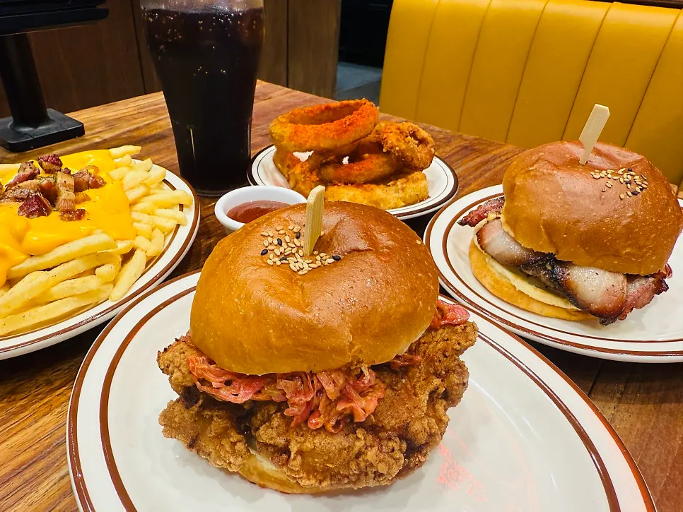 Burgers and side dishes served