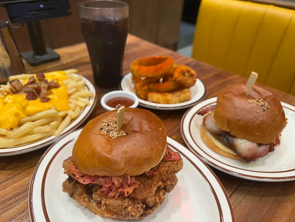 A full spread of burgers and fries