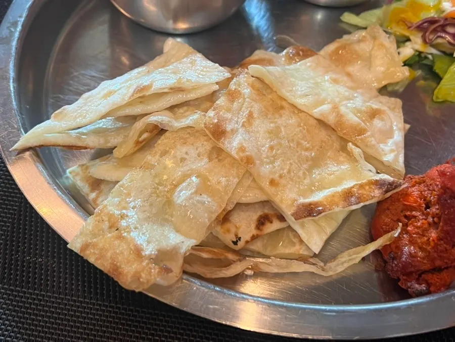 Green salad served with curry