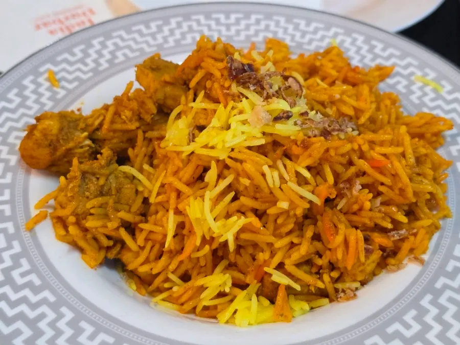 Chicken fried rice served on a plate
