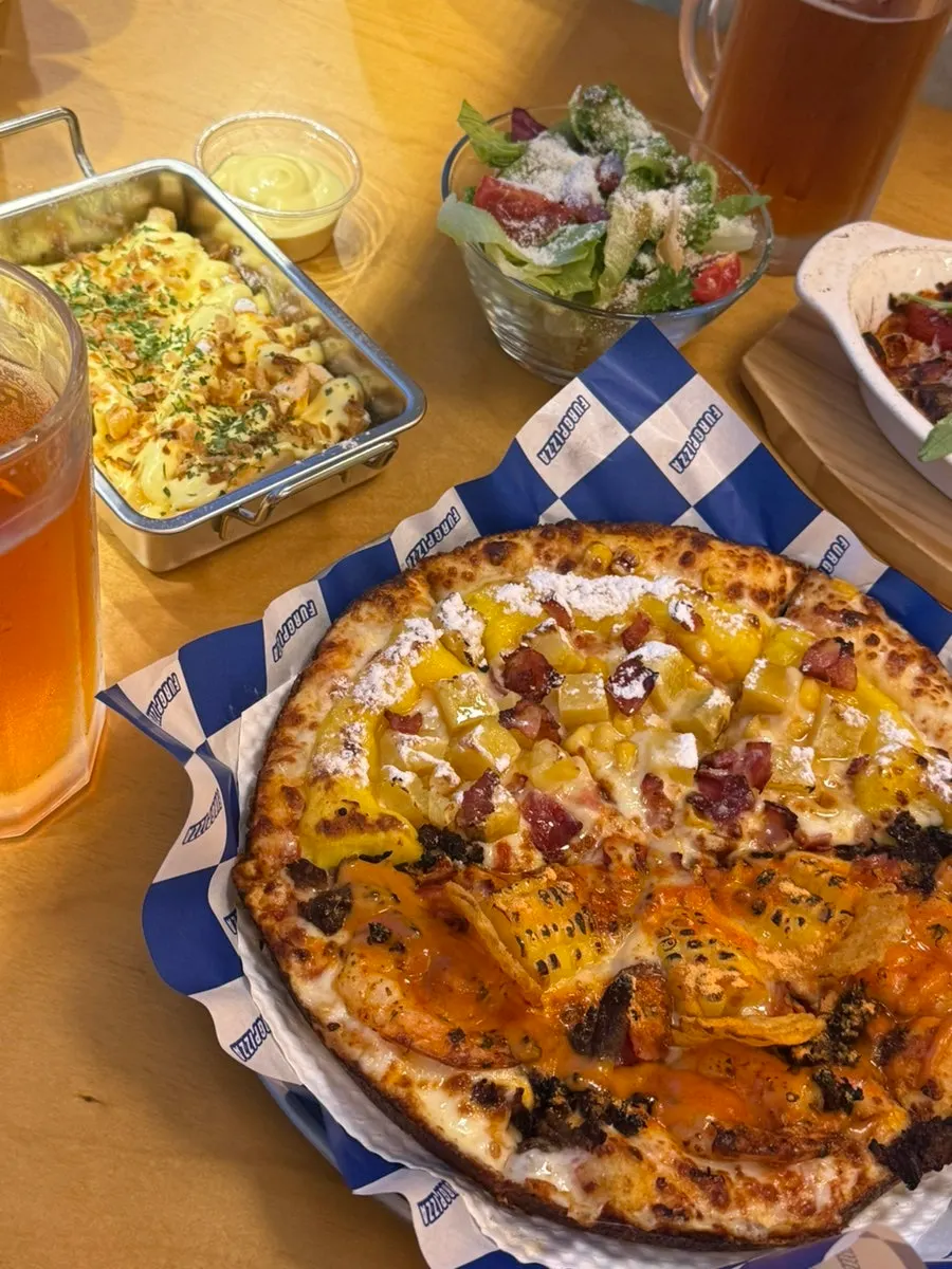 Pizza, pasta, Buffalo wings, and fries