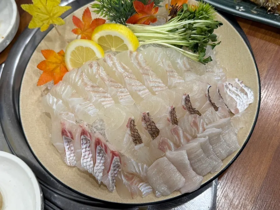 Grilled shrimp heads brought back to the table