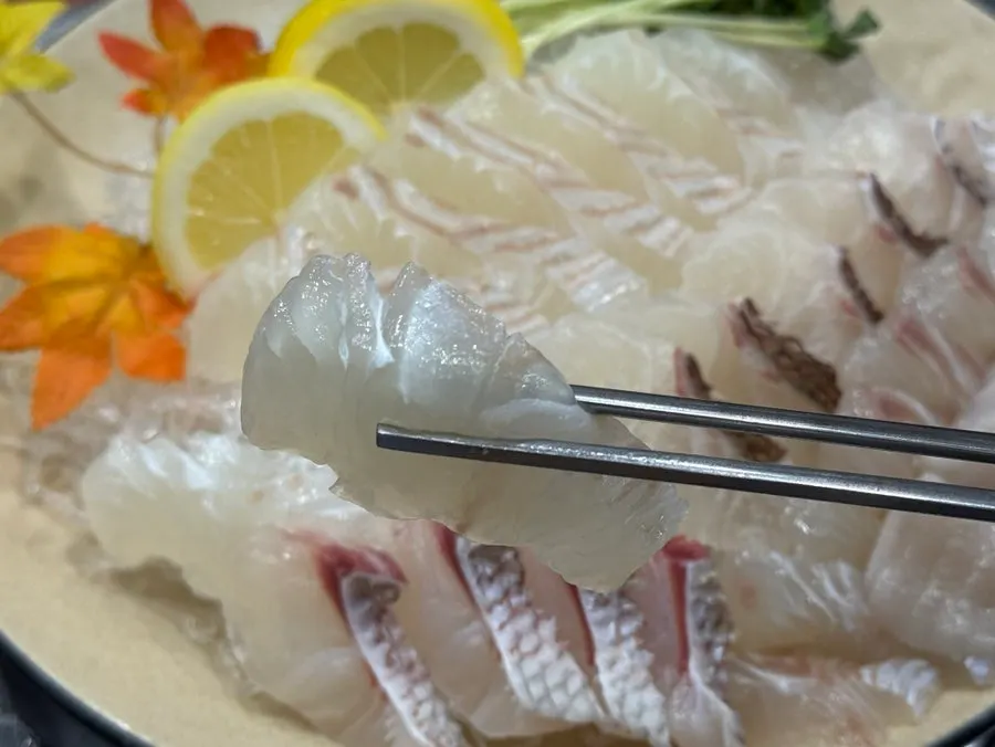 Sashimi plate generously topped with fins