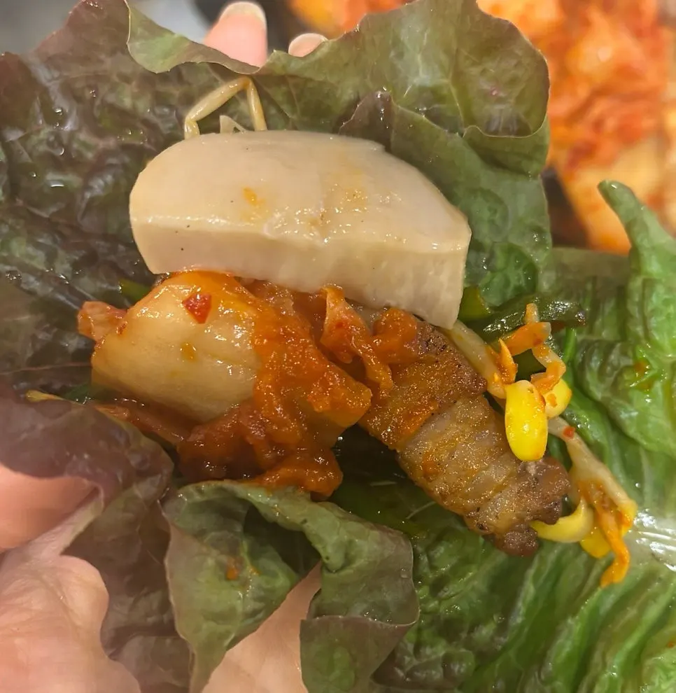 Wrapping meat with side vegetables
