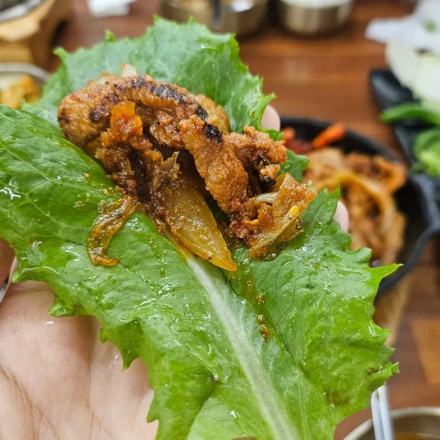 Wrap topped with stir-fry and rice