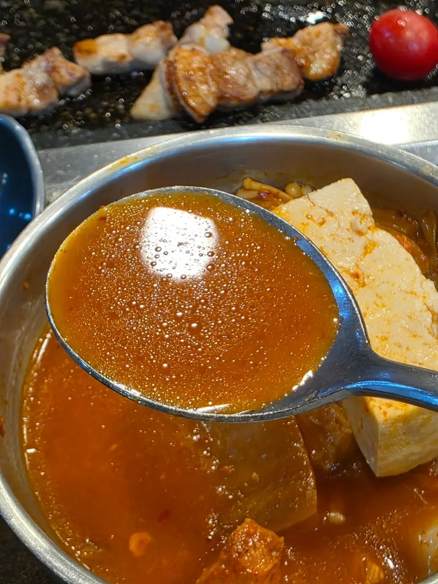 Simin Sikdang's kimchi stew bubbling away