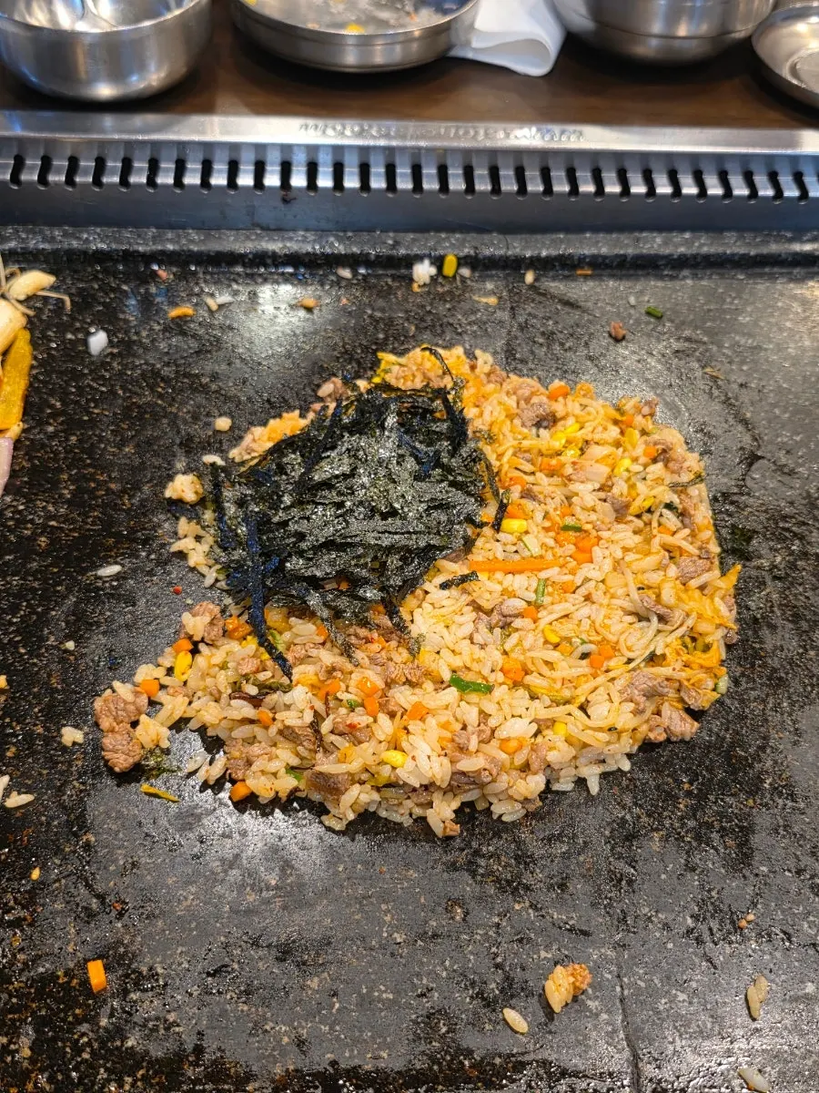 Fried rice ingredients arranged on a divided platter