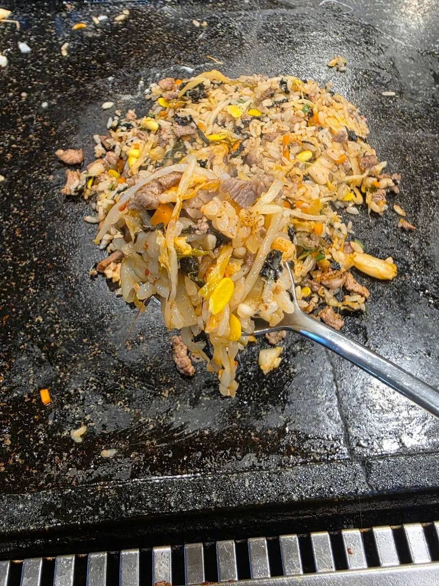 Cheese stretching from the wagyu-topped cheese fried rice