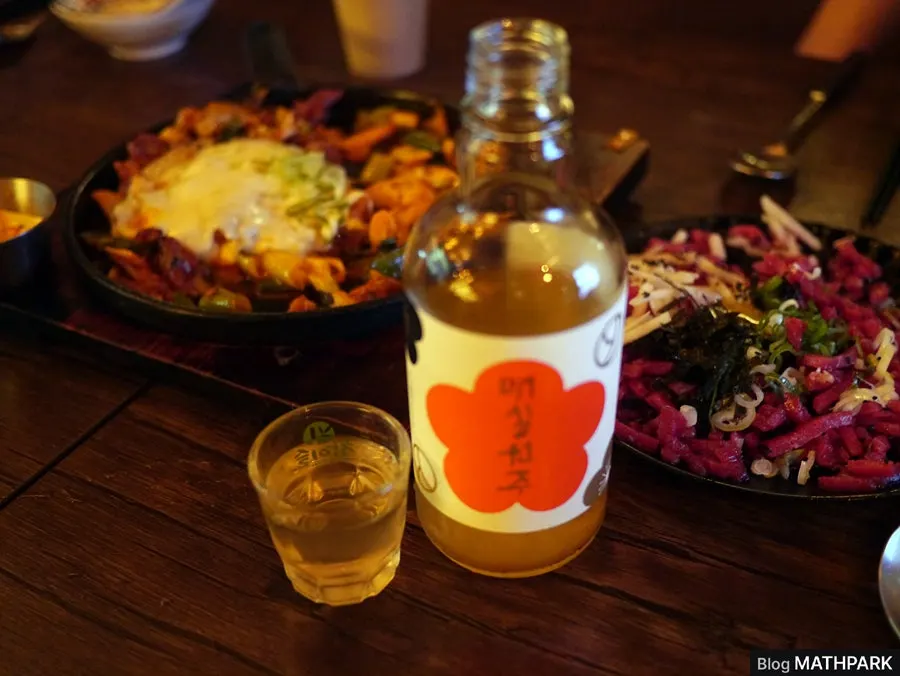 A plate of cold yukhoe topped with pear