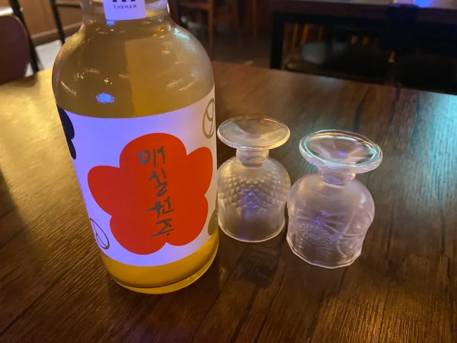 Chilled dedicated glass for the plum wine, fresh from the fridge