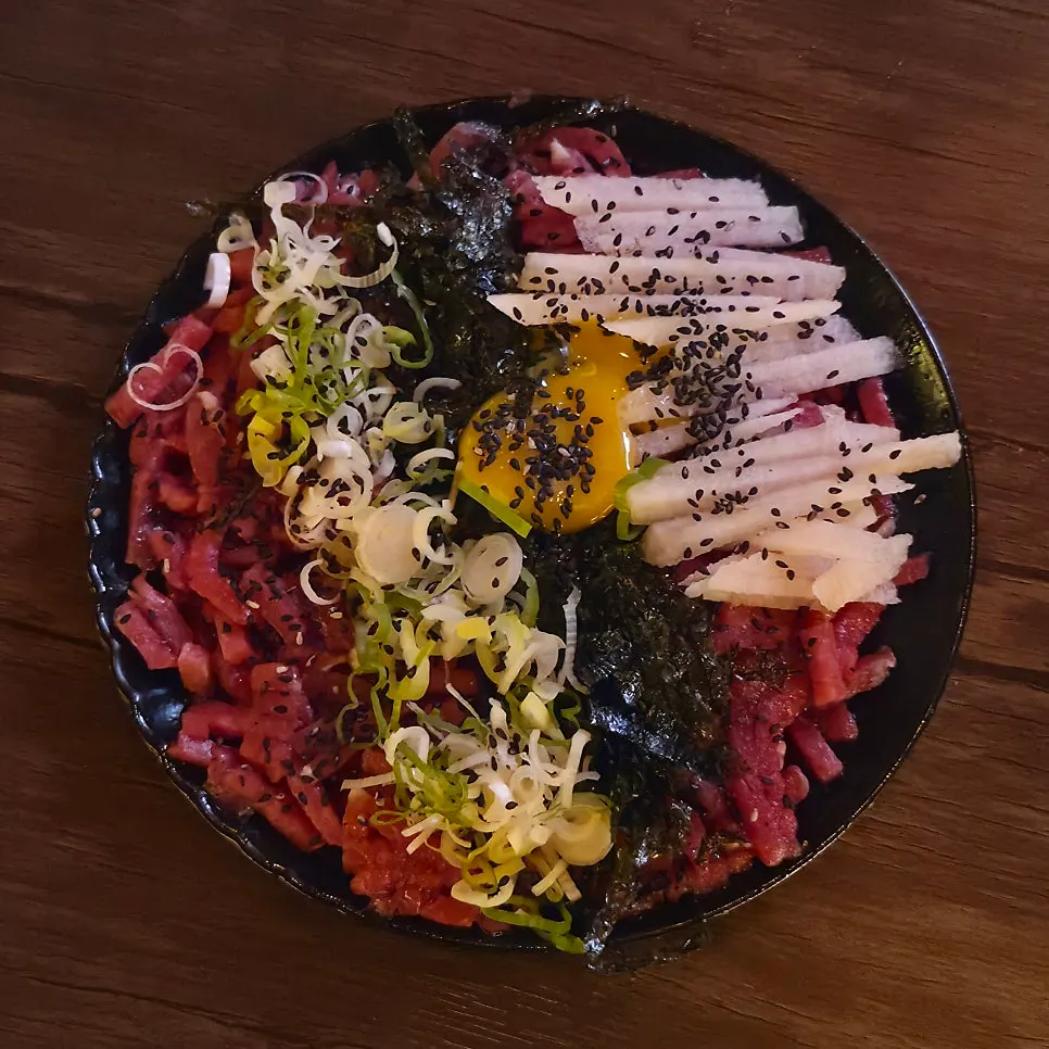 Close-up of a plate of Yukhoe-ui Jeongseok raw beef tartare