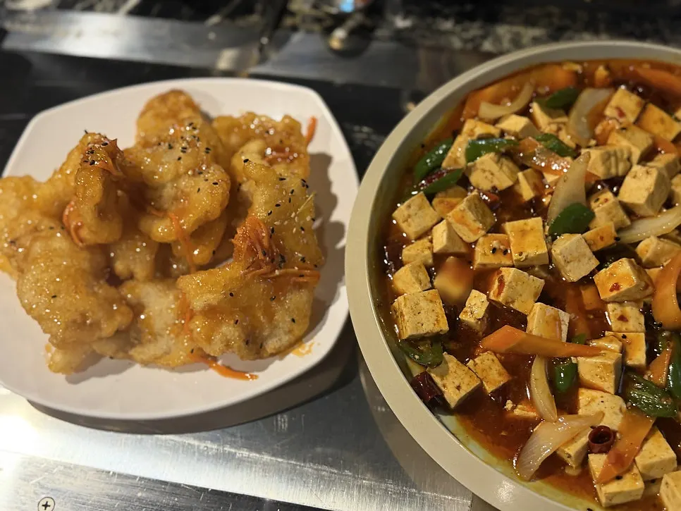 Two Chinese dishes set out as round-two sides