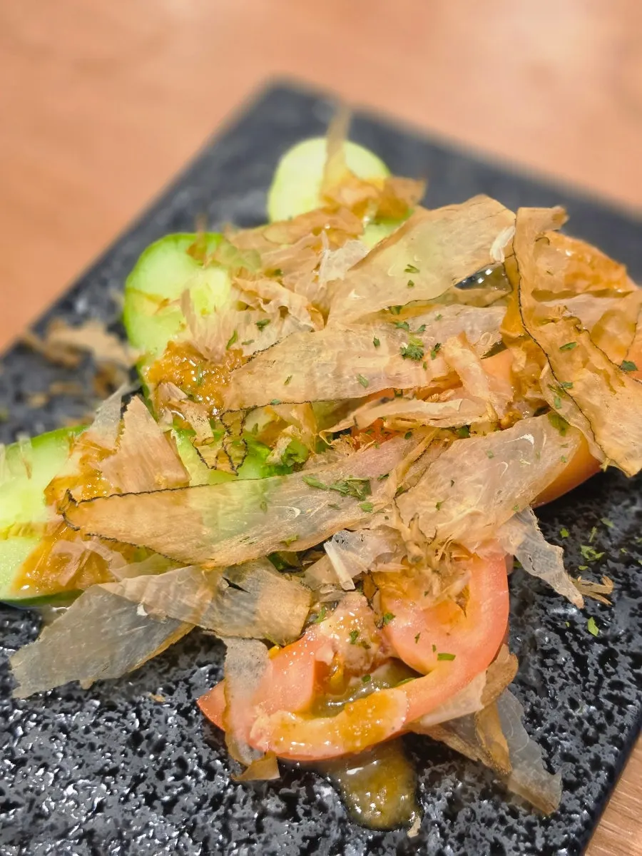 Katsuo goma salad topped with bonito flakes