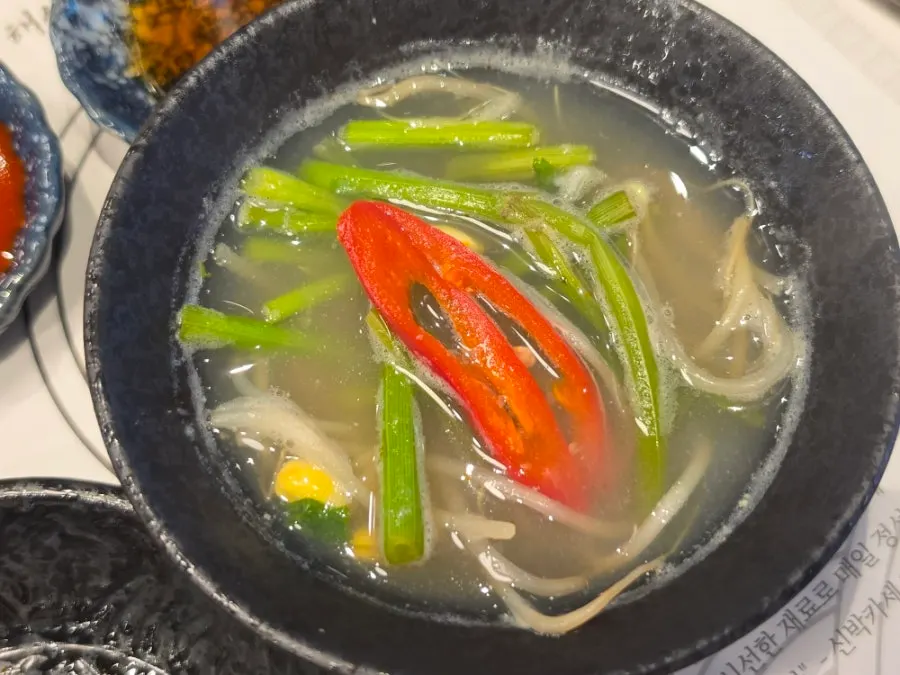 Monkfish jiri stew bubbling on the table burner