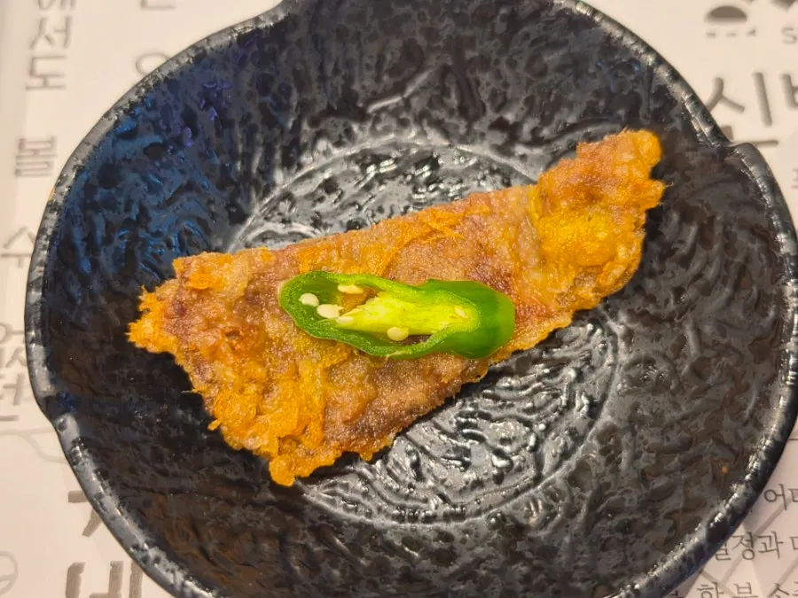 Plate of warm beef striploin yukjeon
