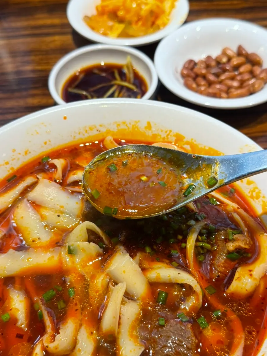 Close-up of the beef knife-cut noodle broth