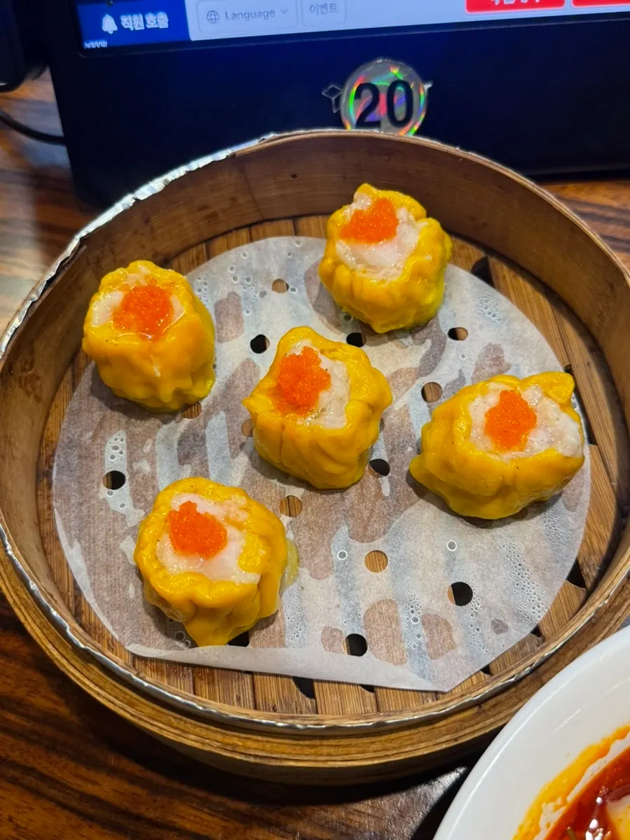 Shumai topped with flying fish roe at Sinbok Myeongwan