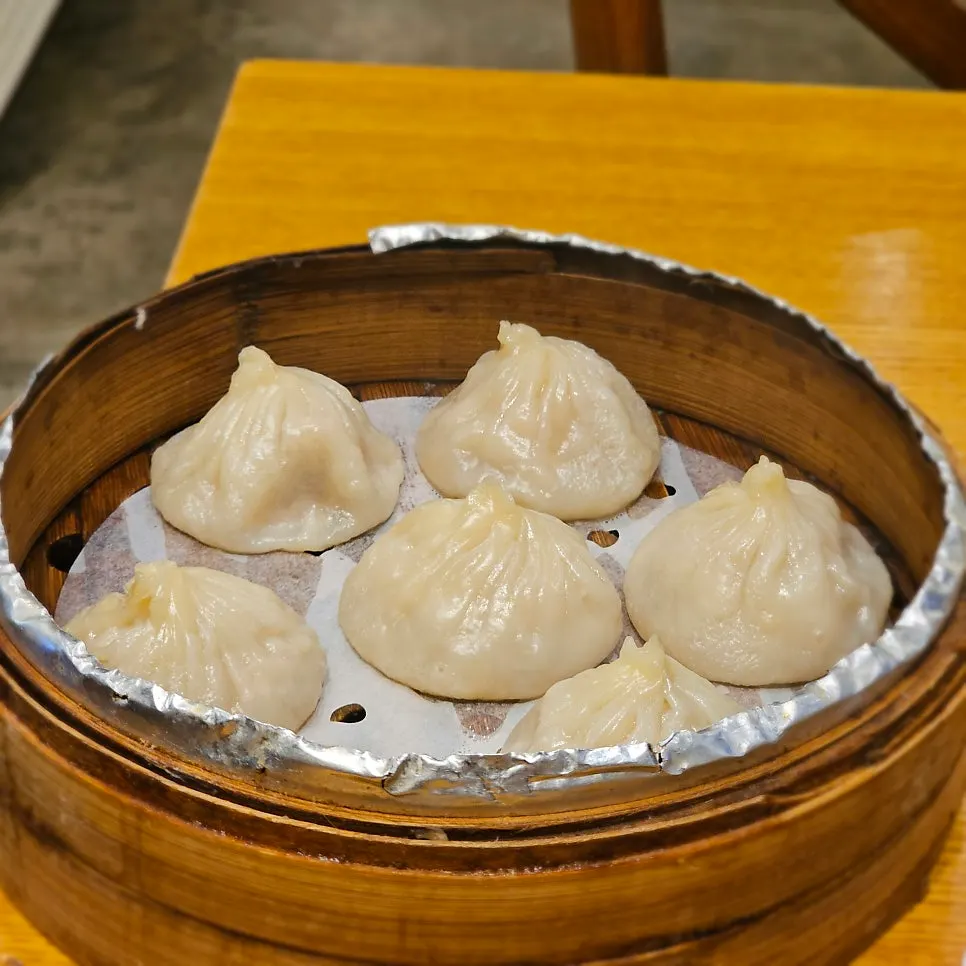 Xiaolongbao served in a bamboo steamer