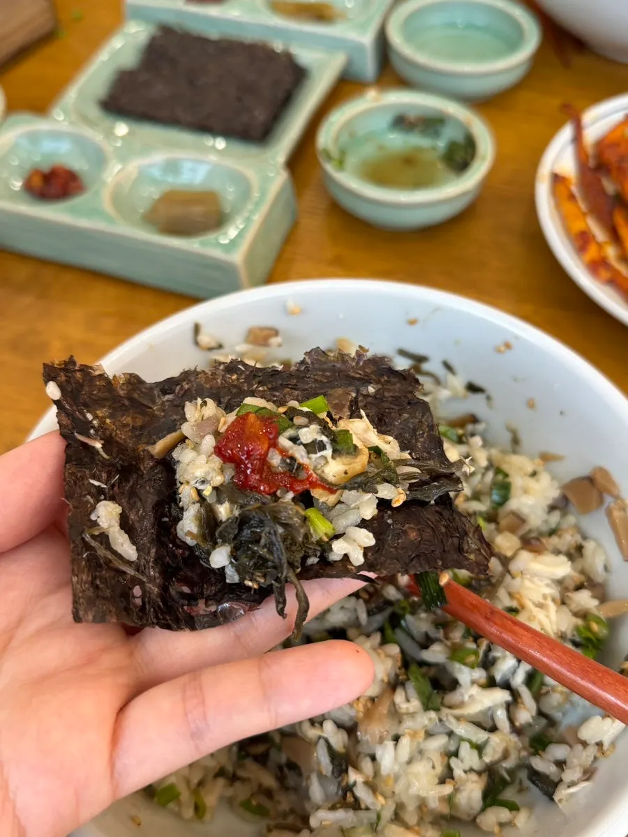Gondre rice bowl served with salted seafood on the side