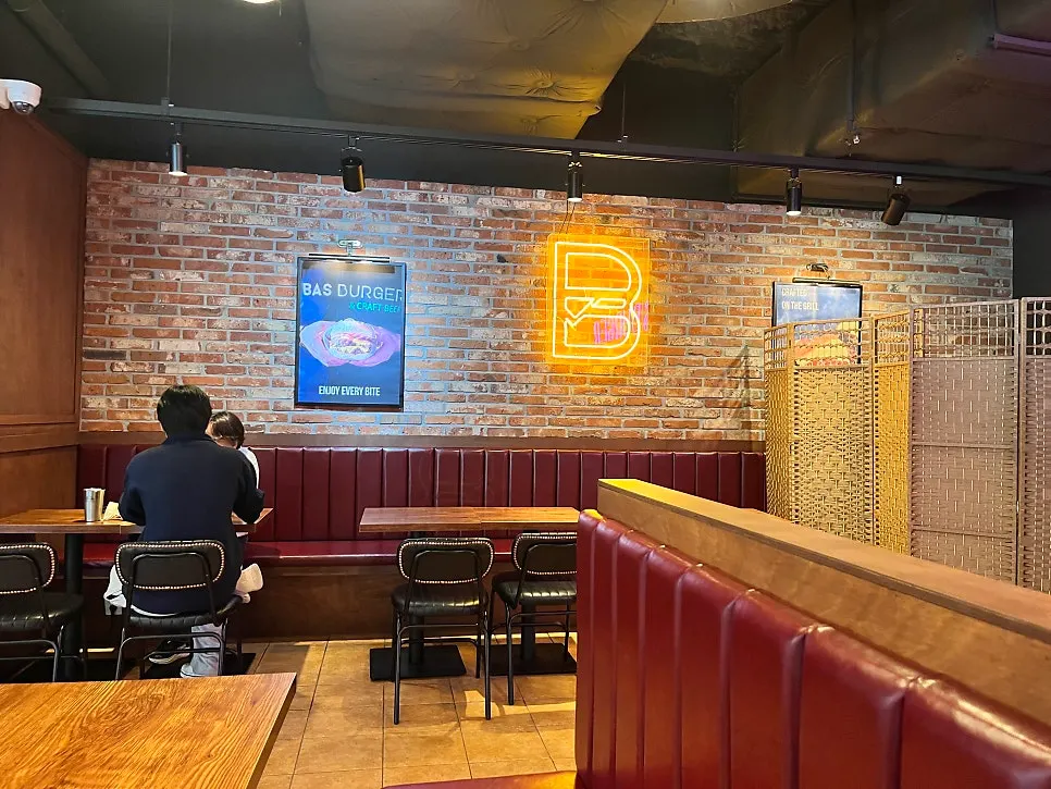 Seating area inside the Bas Burger store