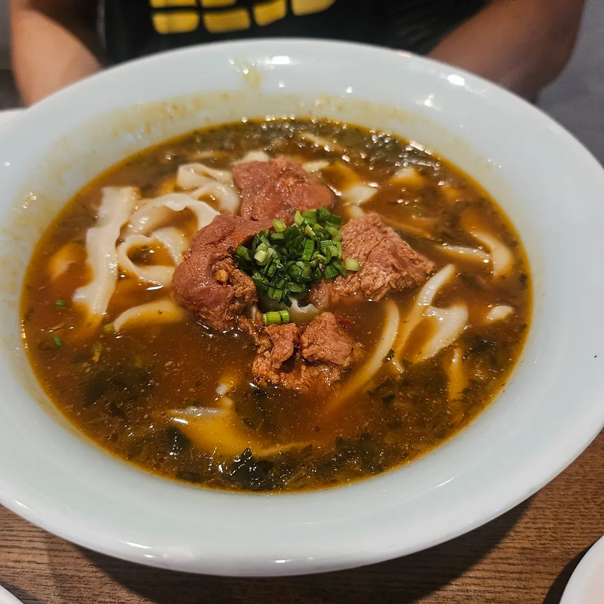 Cheonghwaweon's beef knife-cut noodles topped with generous chunks of meat