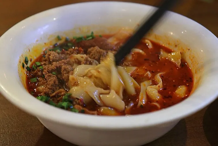 Spicy Sichuan-style broth with beef topping