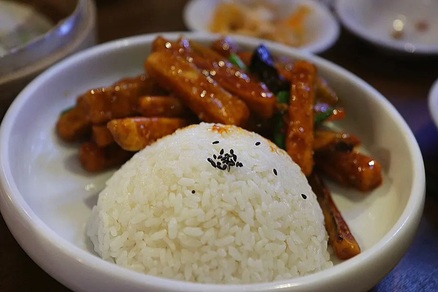 A spoonful of fried rice packed with shrimp