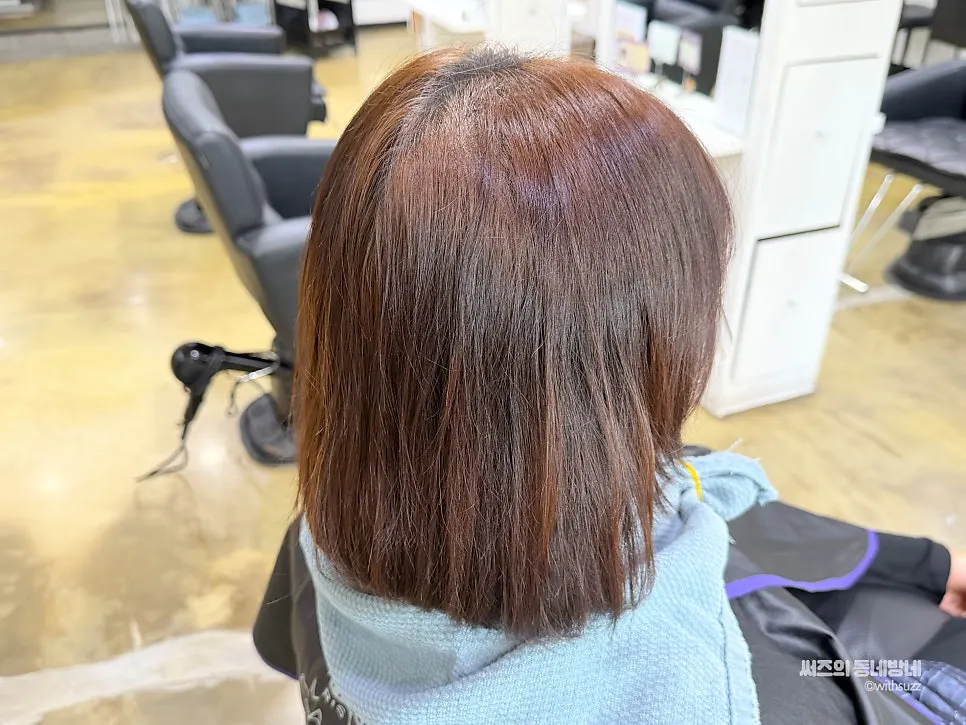 Before photo showing the student-bob feel of the medium-length hair