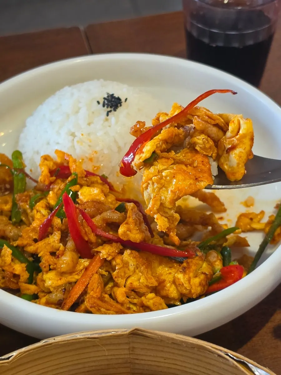 A spoonful of the spicy tiger rice bowl