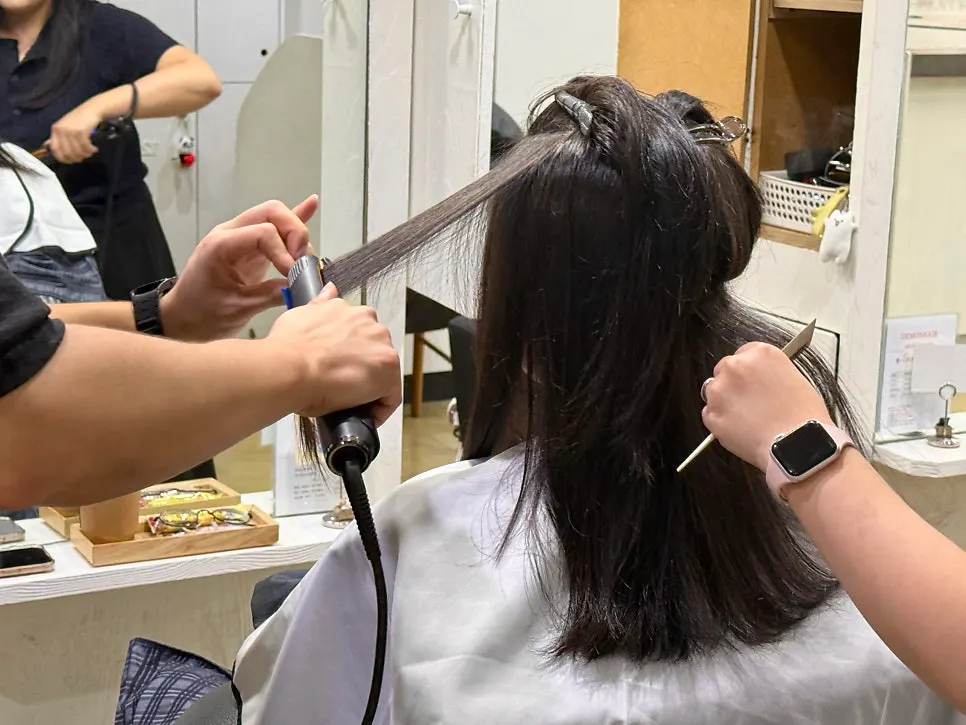 Heat treatment during the volume magic perm process