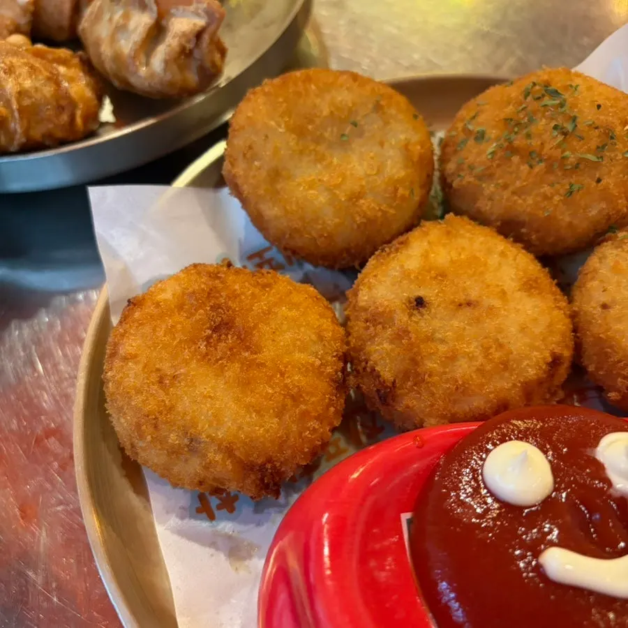 Large mashed-potato croquettes