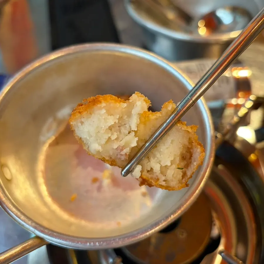 Ketchup sauce and potato croquettes