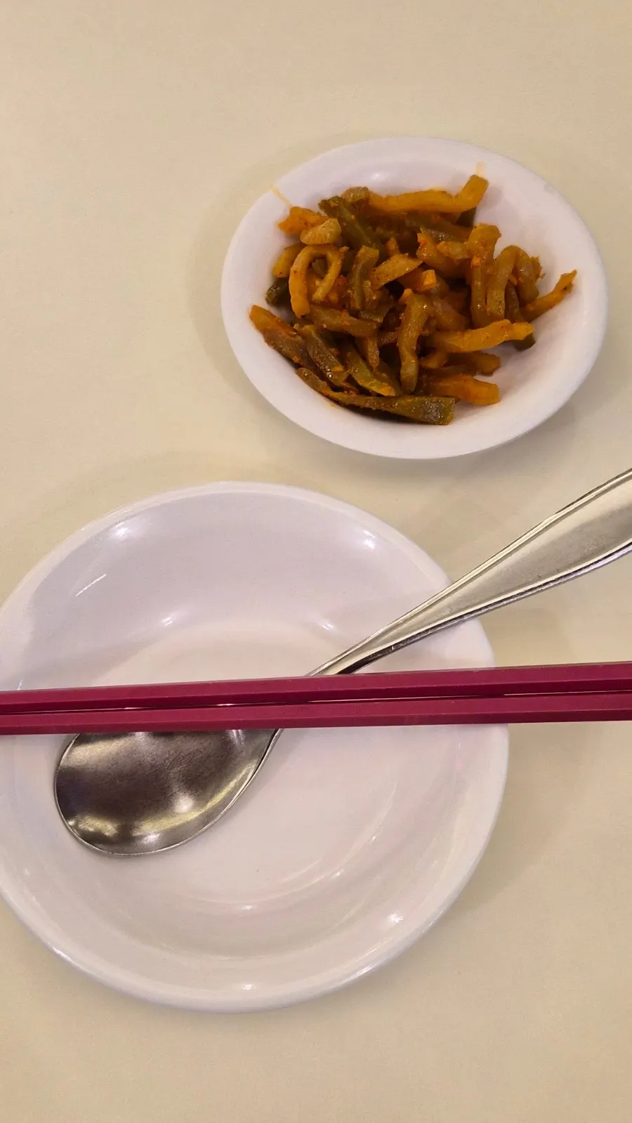Table with sauces and basic utensils neatly arranged