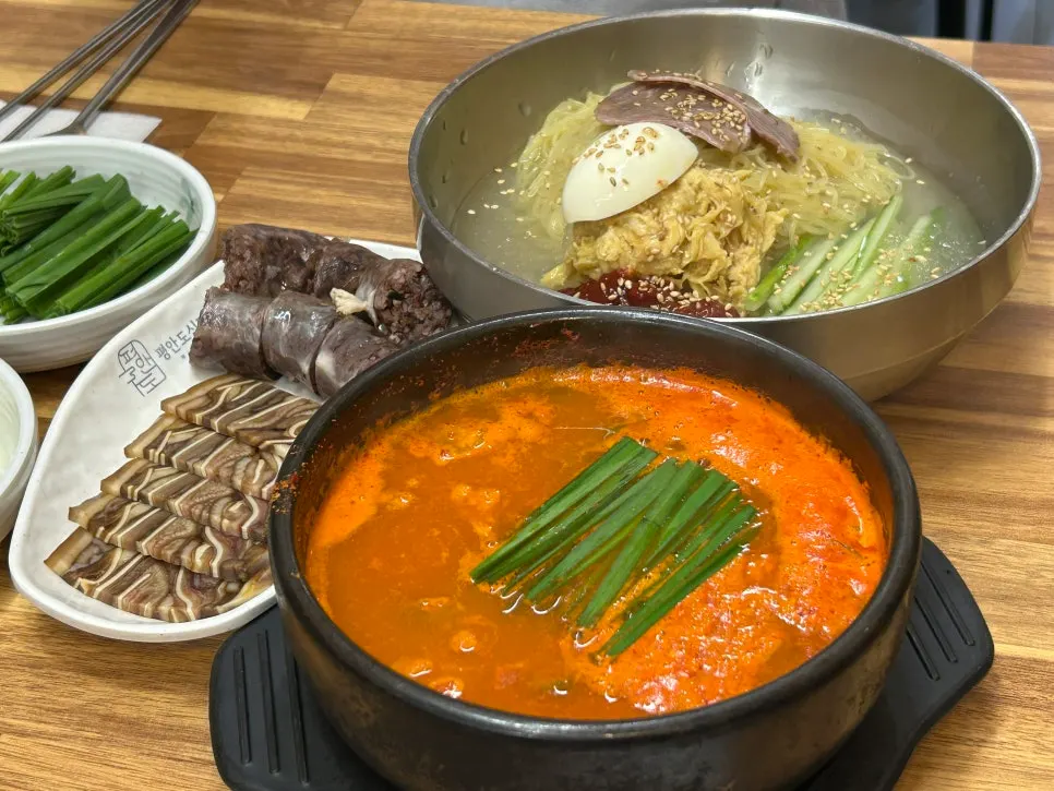 Table set with soup and naengmyeon together