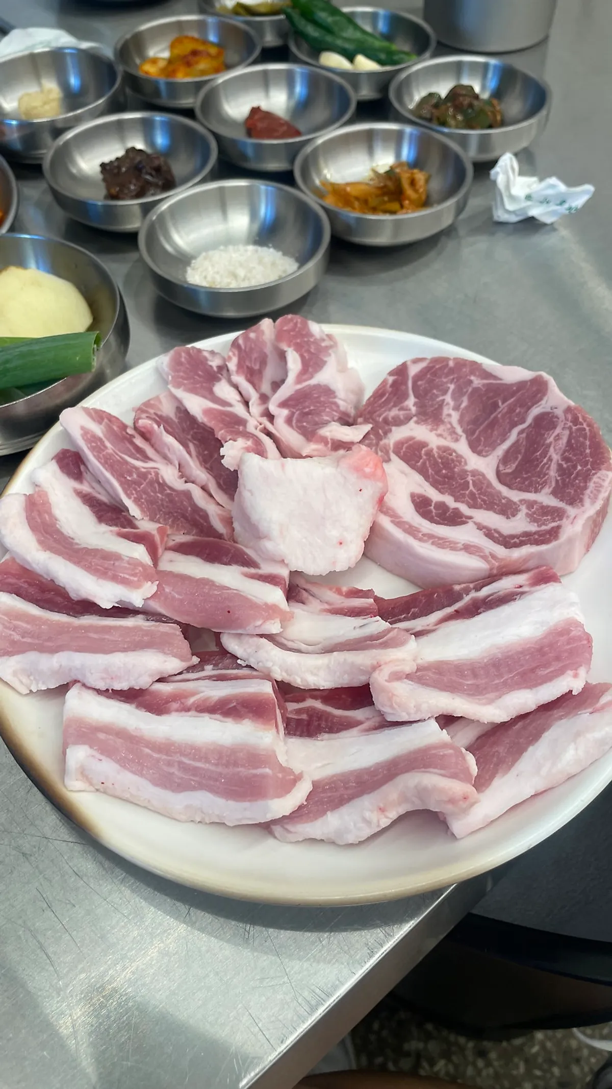 Raw gabrisal, pork neck, and pork belly from the Beefjeong Amdwaeji Set