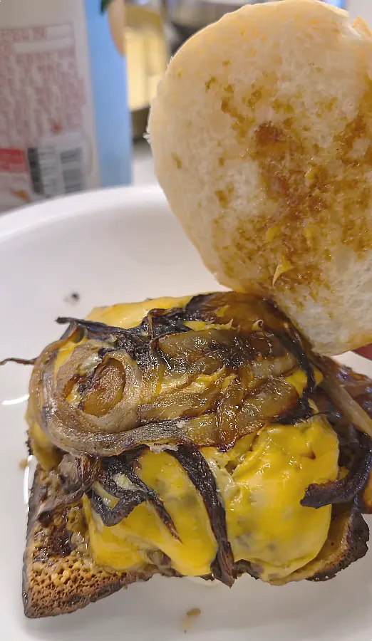 Cross-section of the burger with caramelized onions