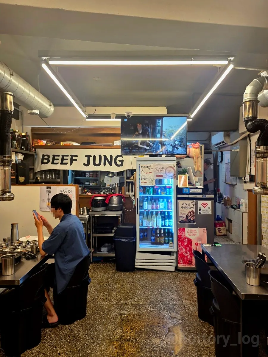 Interior lighting and seating at Beefjeong