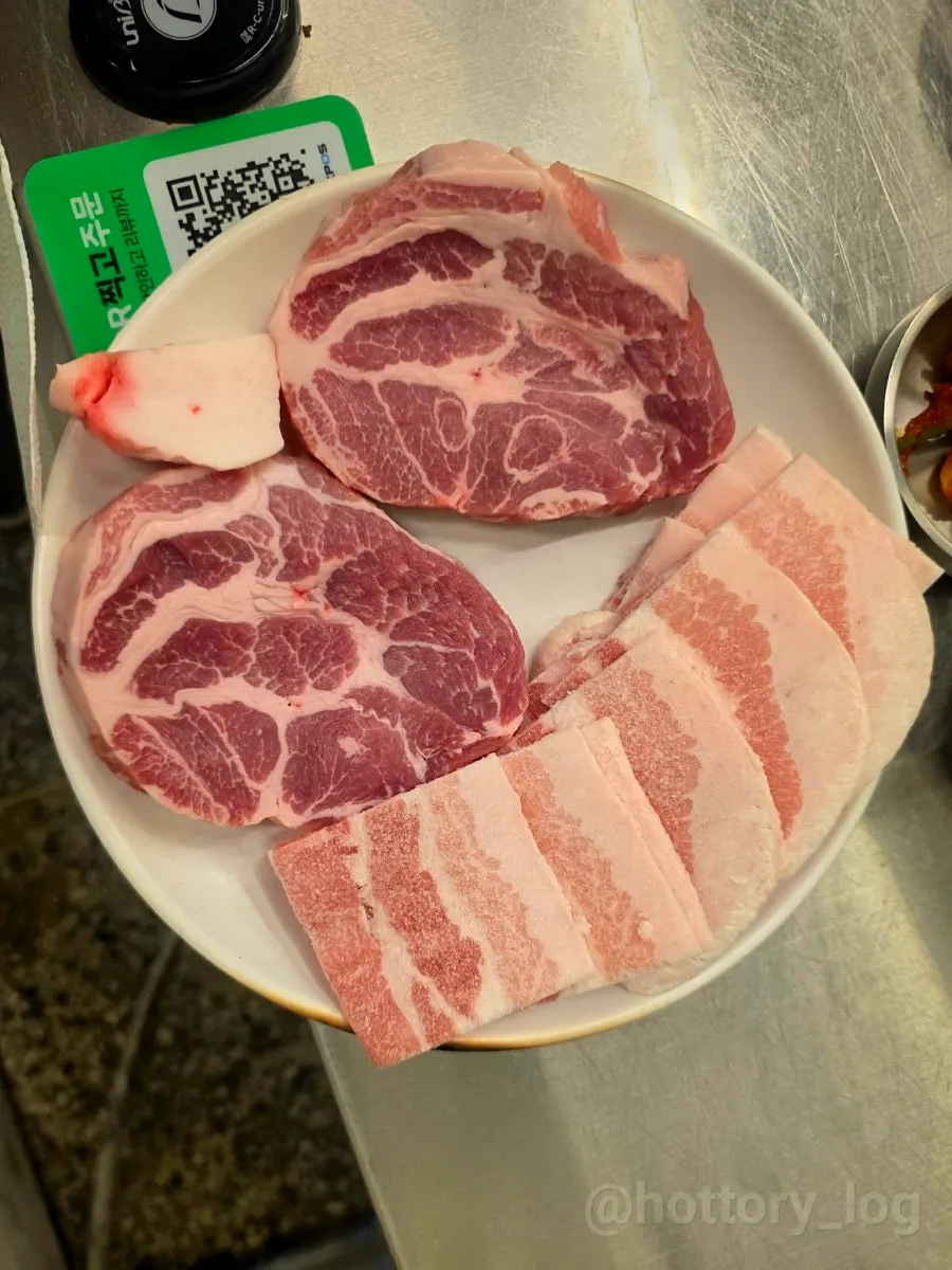 Table set with Beefjeong's frozen pork belly and Korean native pork neck order