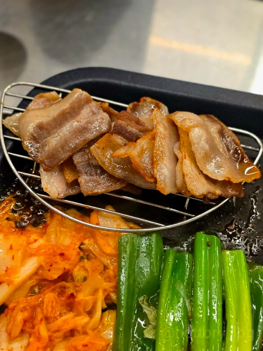 Beefjeong frozen pork belly grilling on the table
