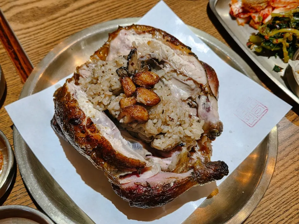 Wood-fired chicken topped with roasted garlic and neungi mushrooms
