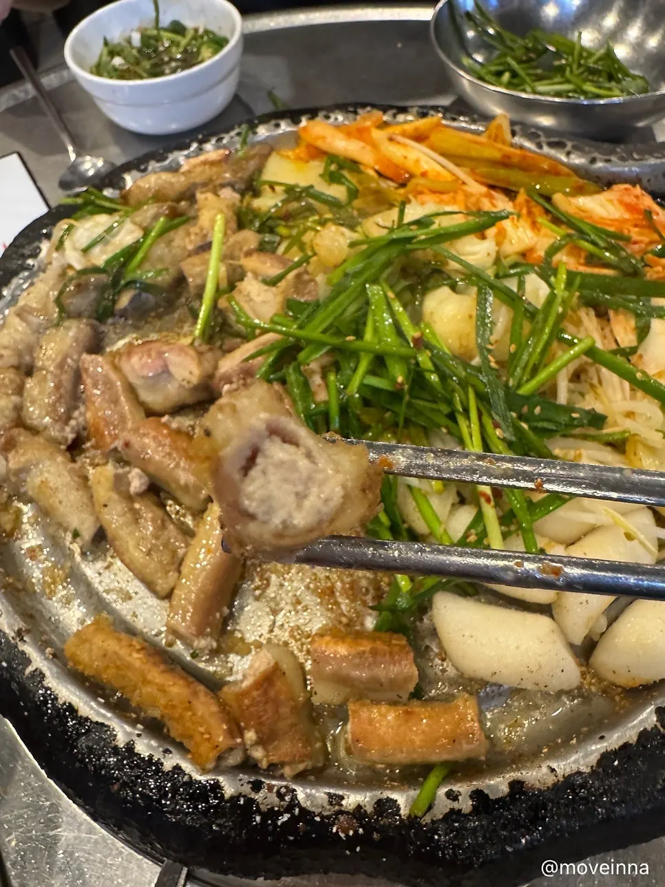 Gopchang and makchang cooking on the griddle