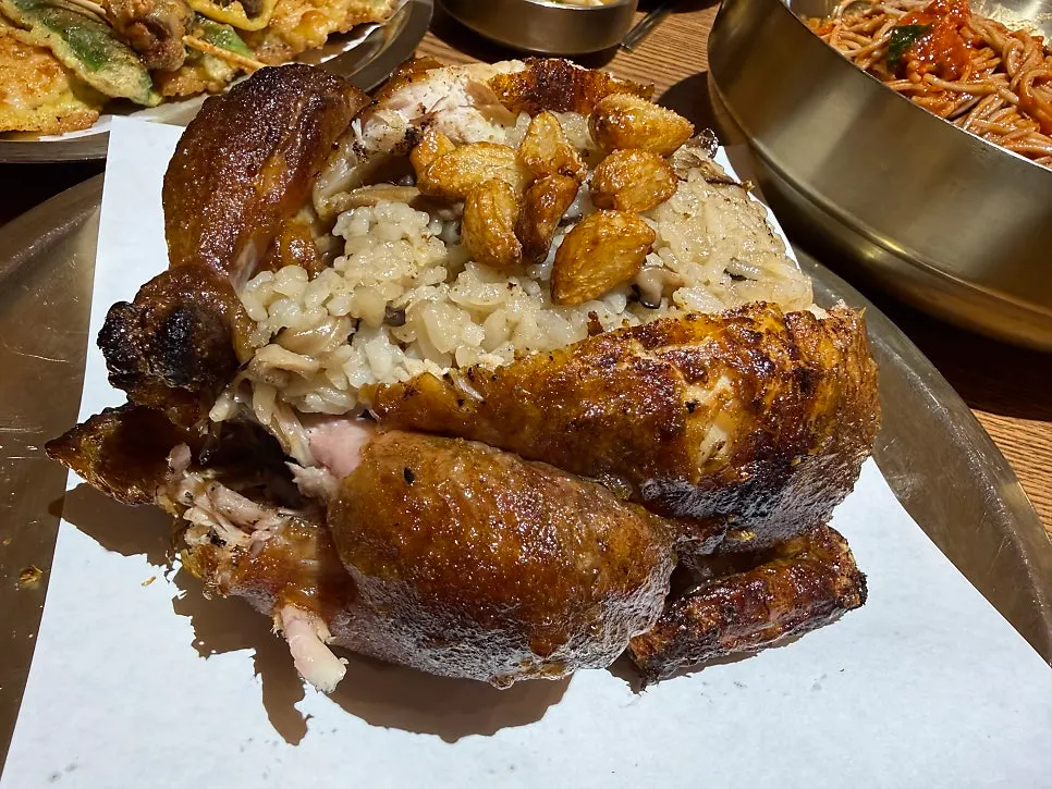 A small, tender young chicken roasted over an oak fire