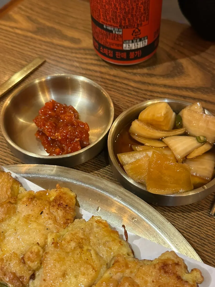Assorted chicken jeon served with seasoned scallop and pickled onion